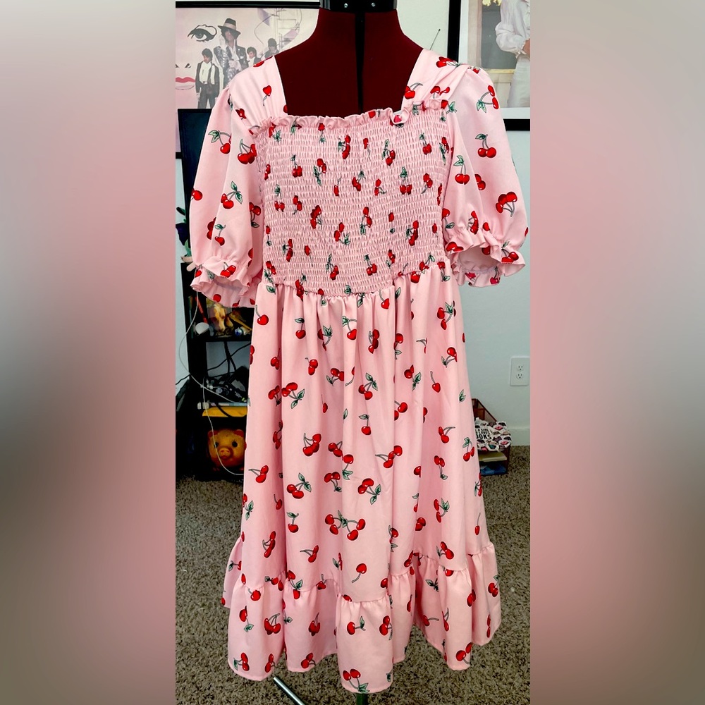Cute Pink cherry dress just right for casual wear.